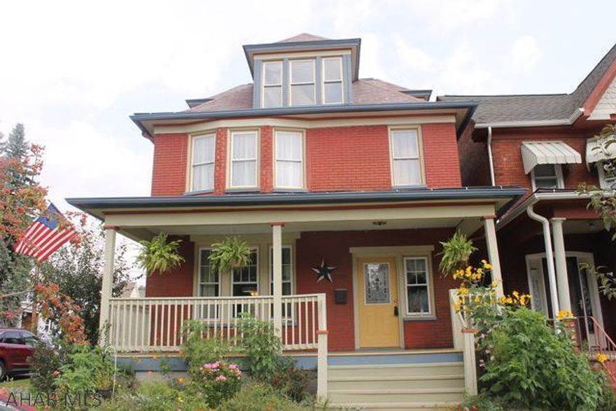 Gorgeous brick home located in the Juniata area of Altoona.  As you enter the foyer you are surrounded by the beautiful natural hardwood with large rooms and pocket doors!  There are several 3 bay windows that allow a ton of sunlight in the home. The dream kitchen with black walnut counters, white cabinets and original hardwood flooring is a must see. The 2nd floor has NEW carpet through out, full bath and laundry room. The 3rd floor is bright and cheery, perfect for additional living space. This home is conveniently located to basketball/volleyball courts, spray park playground, stores and school. Don't let this gorgeous solid brick home get away, call the listing agent today to schedule your showing today!