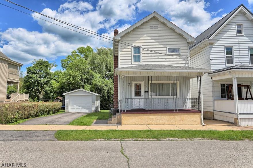Nice 3 bedroom house in the heart of Tyrone. Covered front porch, covered back patio, and spacious yard. Detached garage and off street parking.