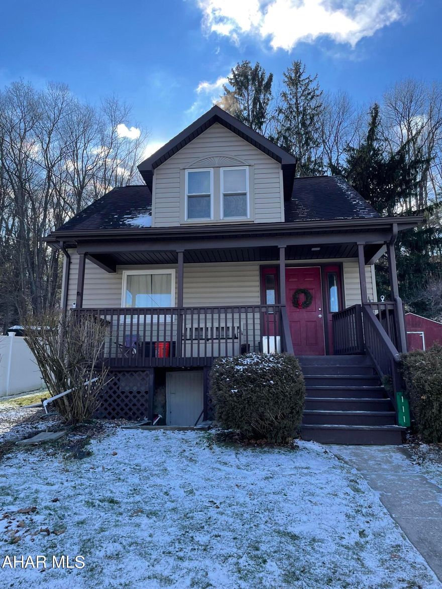 This property has had most of the major mechanics recently replaced and will make the perfect starter home. Enter the home from the large covered porch into the spacious living room.  The dining area has new flooring and the addition of the coal/pellet stove provides another heat source on those chilly winter days and the sliding glass doors in the dining area go out to the deck perfect for grilling or entertaining family and friends.  The kitchen has had a few updates and the custom pot rack saves space in cabinets for food storage.  Upstairs you will find an updated full bath and three bedrooms.  There is attic storage.  Laundry is located in the basement.  New furnace, new hot water heater, french drains installed to divert water and a sump pump for extra protection.     Close to walking/biking trails, ball fields, park and the New Lilly Library.  Call today to see what this property has to offer.  Pre approved buyers only.