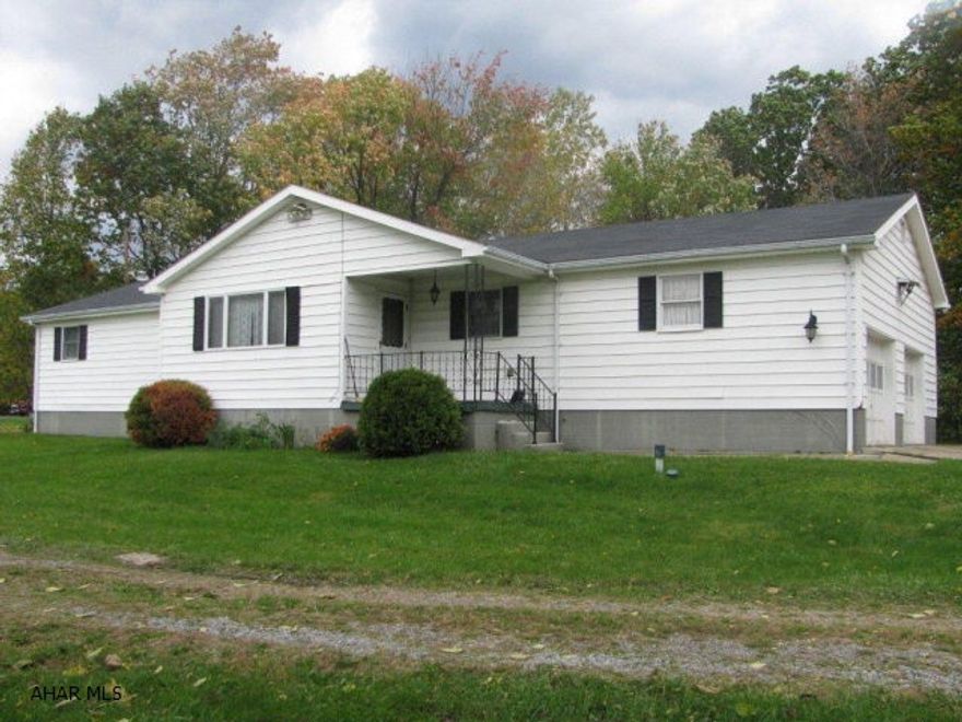 Spacious Bellwood ranch on over 1 acre!! This home offers large lining room w/ brick fireplace, dining room, EIK. w/snack bar and huge pantry closet, 1st floor laundry, master bedroom w/full bath plus 2 more large bedrooms and hall bath! Full basement w/brick fireplace w/ wood burner insert offers more room to expand! attached 2 car garage completes this home!