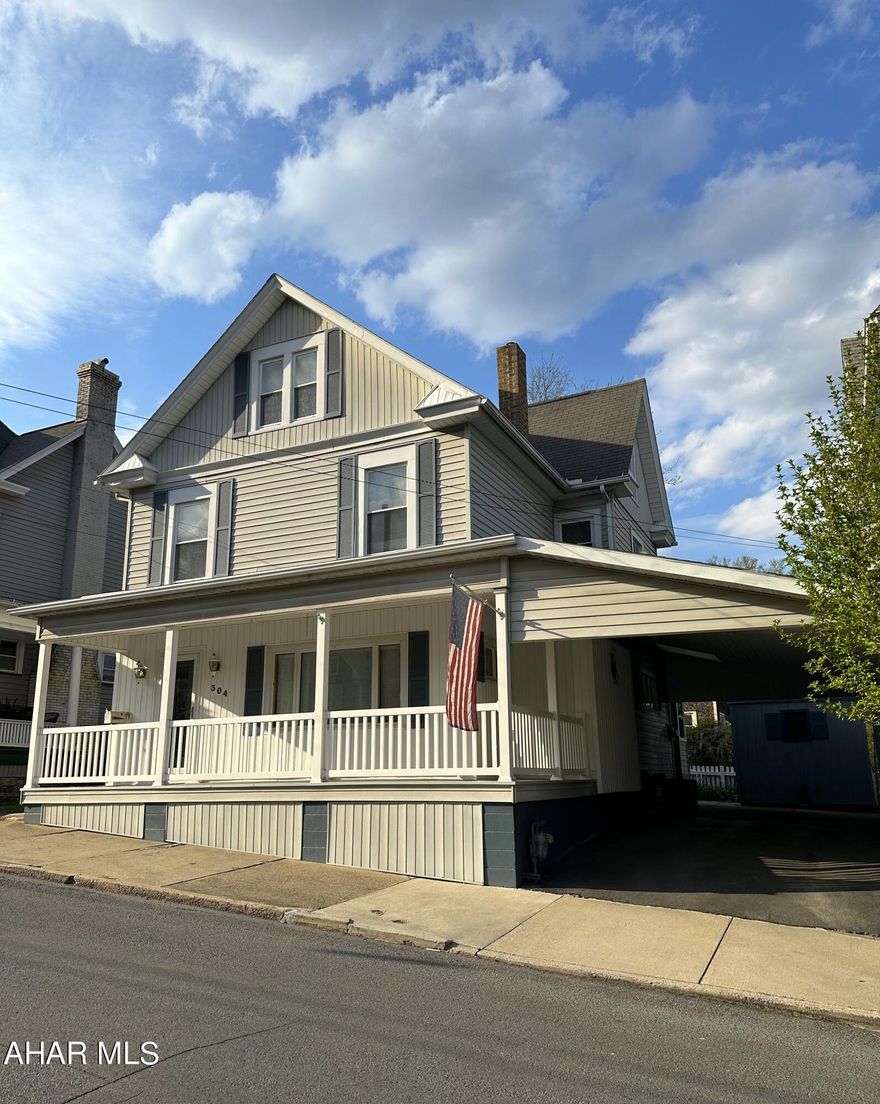 Meticulously maintained, move-in ready 3 bedroom, 2 bathroom home in the heart of Tyrone borough! This home features hardwood & vinyl flooring throughout, spacious kitchen with easy flow to the large dining room and living room with wood fireplace for cozy nights. Large bay window in the living room provides plenty of natural light. Each bedroom boasts a large closet and the attic could be finished as a bonus space or used for storage. The sunroom off of the kitchen is a great space for enjoying your morning coffee or entertaining guests. The large carport could fit 2 cars for off street parking or set up tables to host your party or event! Schedule your showing today!