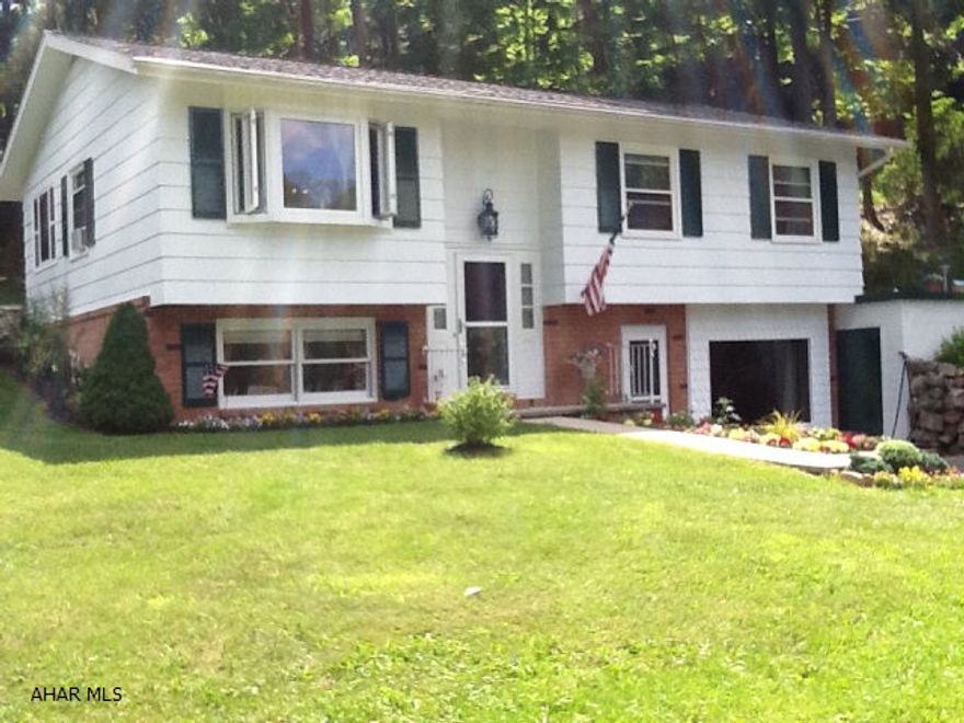 Great location, 3BR renovated home with a large garage. Kitchen recently renovated and has large new window and doors to patio. Lovely large yard with mature landscaping. Move-in ready.