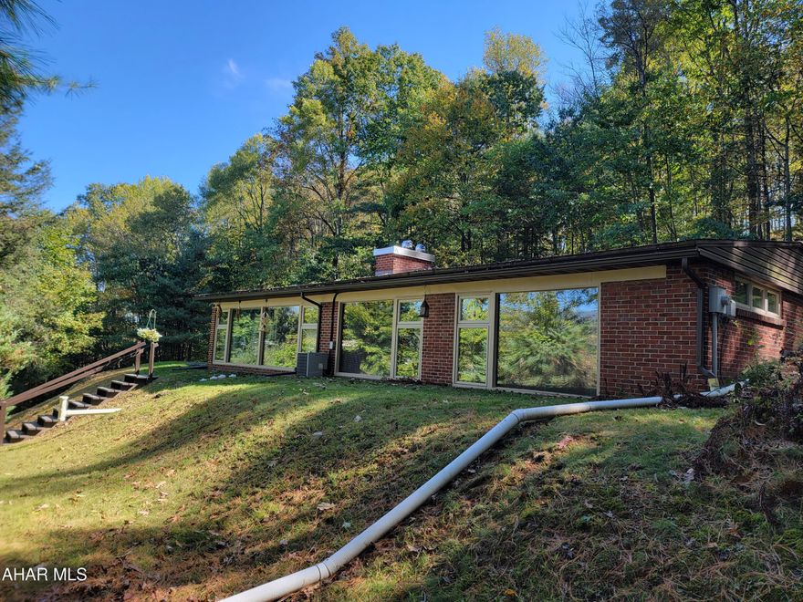 Sprawling brick rancher with open floor plan. Fireplace in living room. Eat-in kitchen. 1 car attached garage. Separate workshop with heat and separate electric. Private location on dead end street. Must be seen.