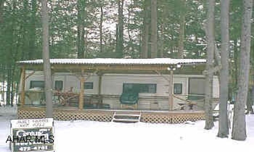 Gated community- beautiful camper w pavillion & deck on deeded lot. Gated community- beautiful camper w pavillion & deck on deeded lot.