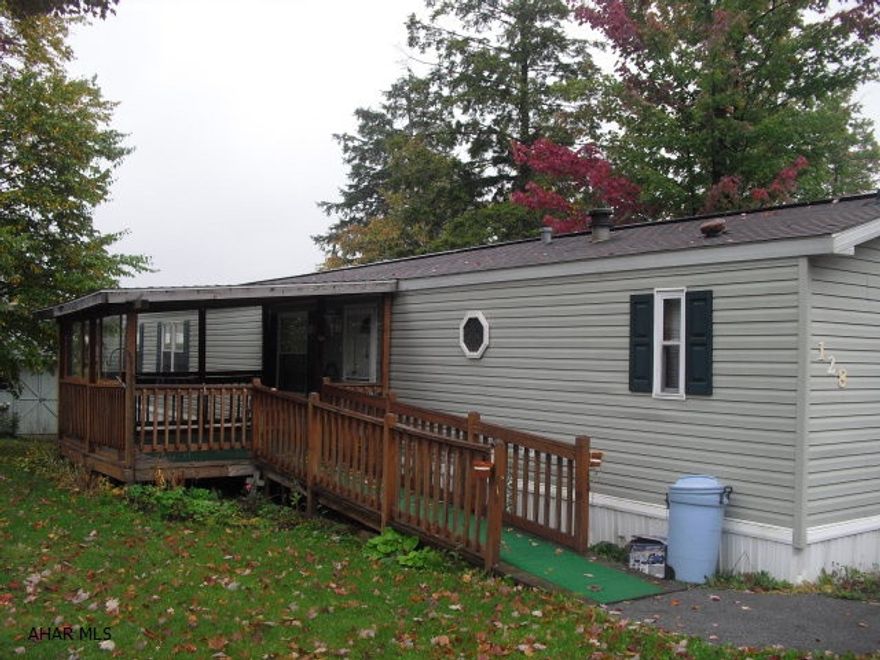 16x80 1999 Champion home. Move in ready. Home has many fine features. new windows and beautiful porch. Home is on a rented lot. rent is 317.00 per month which includes garbage and sewage. A must see!