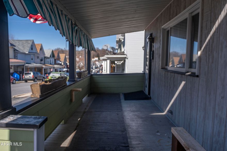 Affordable 2-bedroom, 1.5-bath traditional home in the City of Altoona with potential for a 3rd bedroom in the walk-up attic! This home offers 1,278 square feet of living space and plenty of opportunity. The main level features a spacious living room with a stone accent wall, a formal dining room with ceiling fan, and a large eat-in kitchen with a skylight that brings in natural light. A convenient first-floor laundry area with half bath adds everyday functionality. Upstairs includes two bedrooms--one with double closets--and a full bath. The walk-up attic provides excellent storage or could be finished for a third bedroom, office, or additional living space. Additional highlights include a full walk-out basement, fenced yard, covered porch, and off-street parking for two or more vehicles. Located in the Altoona Area School District.