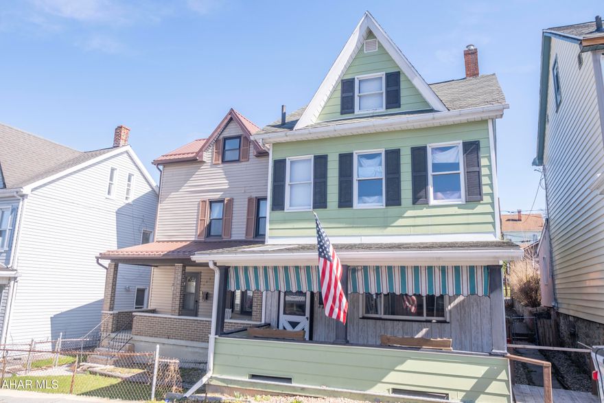 Affordable 2-bedroom, 1.5-bath traditional home in the City of Altoona with potential for a 3rd bedroom in the walk-up attic! This home offers 1,278 square feet of living space and plenty of opportunity. The main level features a spacious living room with a stone accent wall, a formal dining room with ceiling fan, and a large eat-in kitchen with a skylight that brings in natural light. A convenient first-floor laundry area with half bath adds everyday functionality. Upstairs includes two bedrooms--one with double closets--and a full bath. The walk-up attic provides excellent storage or could be finished for a third bedroom, office, or additional living space. Additional highlights include a full walk-out basement, fenced yard, covered porch, and off-street parking for two or more vehicles. Located in the Altoona Area School District.