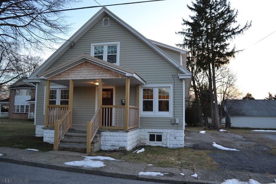 Beautifully remodeled 4 bedroom 2 full bathroom home in Martinsburg borough with one story living. Large rooms, bigger than it looks. All rooms large enough for king and queen beds with room left over! 1 large bedroom, full bath and laundry on 1st floor! Great highly sought after neighborhood. Home has new siding, windows, kitchen, baths, beautiful hardwood flooring, and paint throughout! Agent is related to seller.