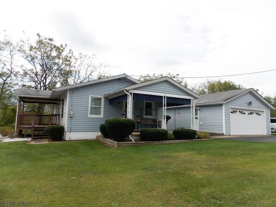 Charming ranch home on the outskirts of town! Eat-in kitchen features tons of cabinets, stainless steel appliances and a tile backsplash. Lovely living room that is very spacious. Bedrooms have ample closet space. New furnace and Air conditioning in September 2019. Large 2 car garage and a 1 car garage will give plenty of storage. Enjoy the amazing view from the front porch! So peaceful and private! If you love a country setting this home is perfect!