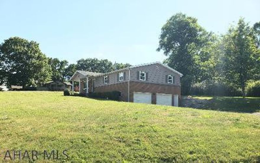 Great 1-story 3-bedroom 2-bath brick & colorlok sided home with new roof, modern kitchen, formal dining room, solar shield windows, + main floor laundry on corner.  .46-acre lot with private back yard.  #J-510