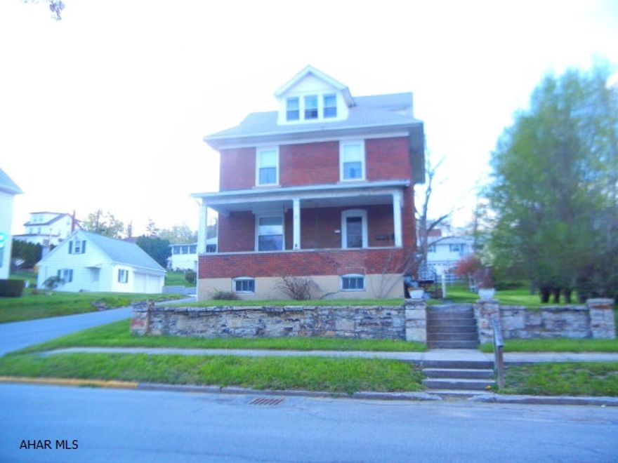 Add your improvements and updates and make this a great family home! Has character! Three bedrooms, 1 bath brick 2.5 story. Nice corner lot. 1 car garage. Great neighborhood setting.