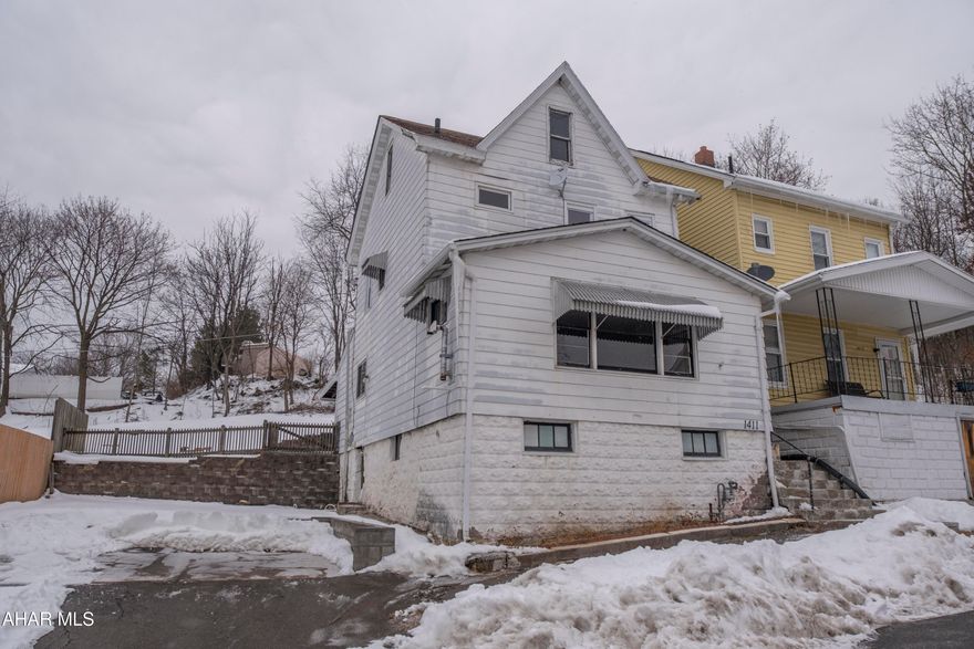 This newly updated 4-bedroom, 1-bath home features a living room with hardwood floors, a formal dining room and a large kitchen that includes an eat-in area. The main floor also provides a dedicated laundry area and mudroom. 3 of the bedrooms are located on the 2nd floor along with the full bath. The 4th bedroom is located in the finished attic and could also be used as a home office or for additional storage. The sale includes an additional 25x120 parcel, which provides off-street parking and extra yard space. Schedule your tour today!