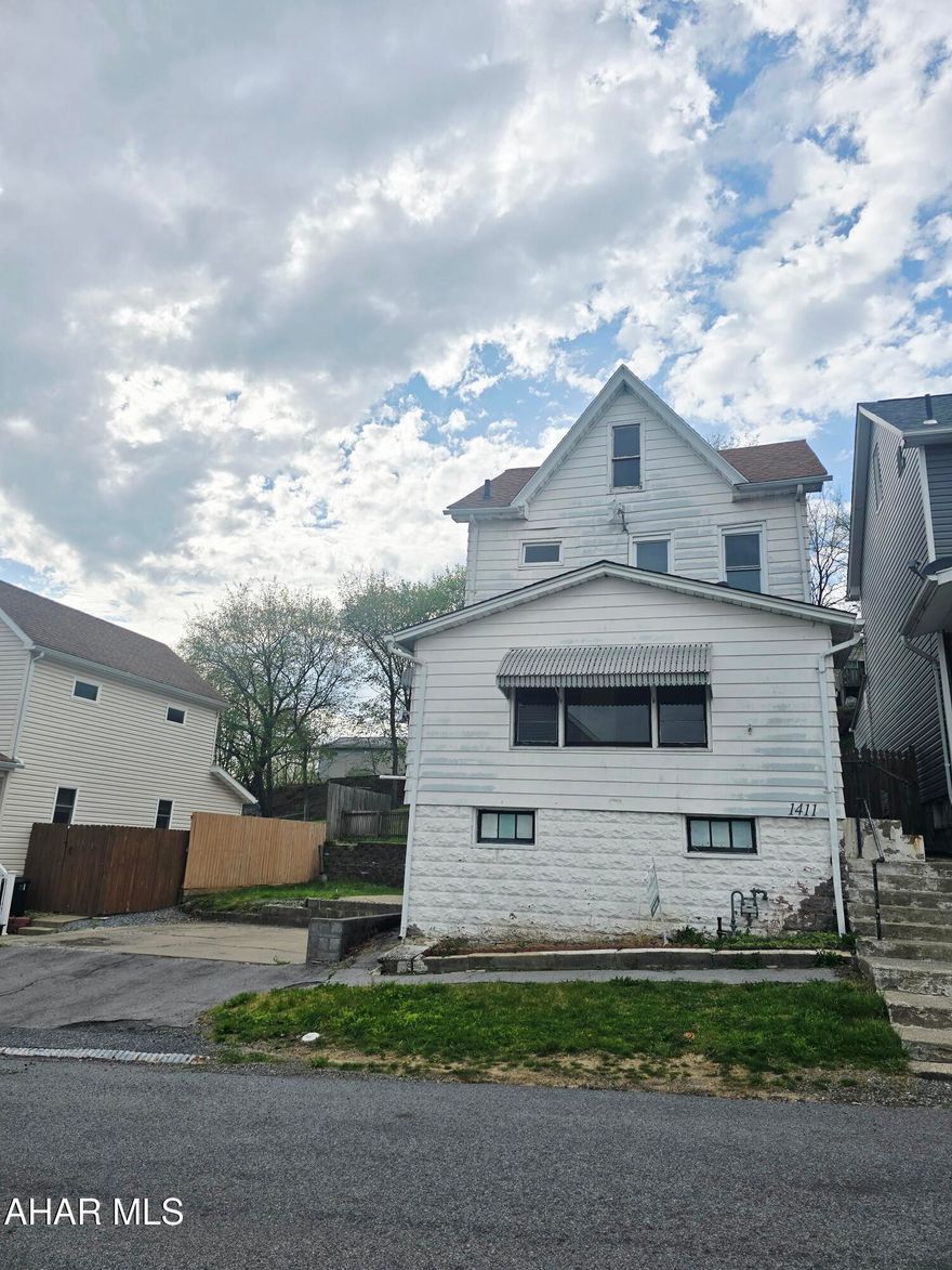 This newly updated 4-bedroom, 1-bath home features a living room with hardwood floors, a formal dining room and a large kitchen that includes an eat-in area. The main floor also provides a dedicated laundry area and mudroom. 3 of the bedrooms are located on the 2nd floor along with the full bath. The 4th bedroom is located in the finished attic and could also be used as a home office or for additional storage. The sale includes an additional 25x120 parcel, which provides off-street parking and extra yard space. Schedule your tour today!