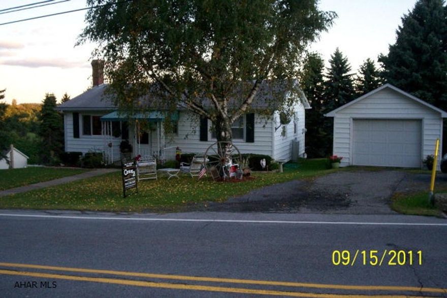 2 bedroom ranch with 1 car garage on a 150 x 50 lot. New carpeting, very clean!