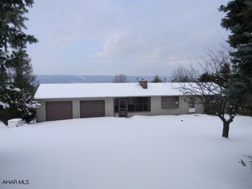 Nice 3BR/2 1/2BA Ranch on 1 acre with 2-car garage. Also, a basement Rec Room, in-ground pool and changing room with bath. Featuring an extended rear view, adjacent to Lake Raystown public land and just 1/2 mile from the 7 Points Recreational Area access gate. Offered AS-IS. Financed offers require BAC pre-qual, cash ofers require proof of funds. Free credit report and appraisal if financed through BAC. VA ADDENDUMS REQUIRED. Better hurry on this one!