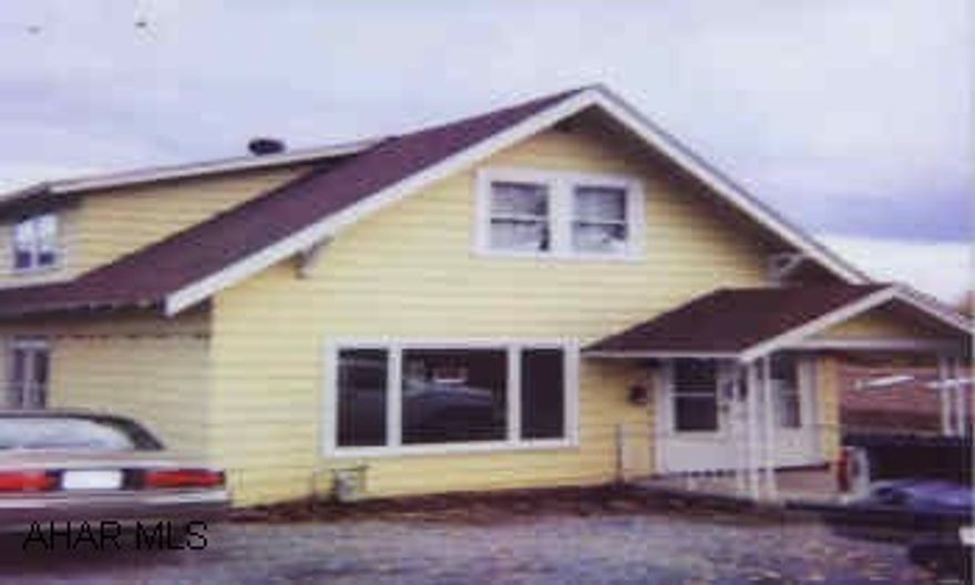 2 STORY 2 UNIT EASILY CONVERTED BACK TO A SINGLE. VERY GOOD CONDITION. 2 STORY, 2 UNIT EASILY CONVERTED BACK TO SINGLE HOME. 100X120 LOT. DOUBLE REAR PORCH W/SPECTACULAR VIEW. 2 CAR GARAGE USED FOR STORAGE.