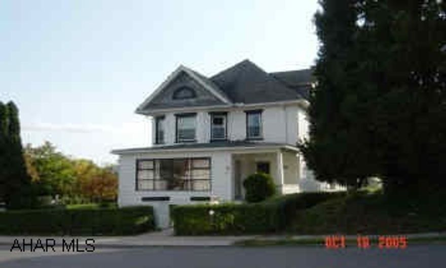 East End Large Brick home. Front sunroom. Rear enclosed porch & deck. Main level laundry. Large lot.