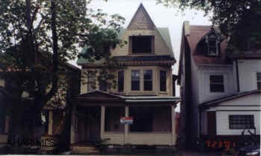 very large 3 story frame home that could be easily duplexed, large rooms, 2 full baths, 5 bedrooms, on a 25x120 lot.  Many possibilites.  Being sold in "as is condition". Very large 3 story frame home that could be easily duplexed,  large rooms, 2 full baths, 5 bedrooms, on a 25x120 lot.  Many possibilites.  Being sold in "as is condition".