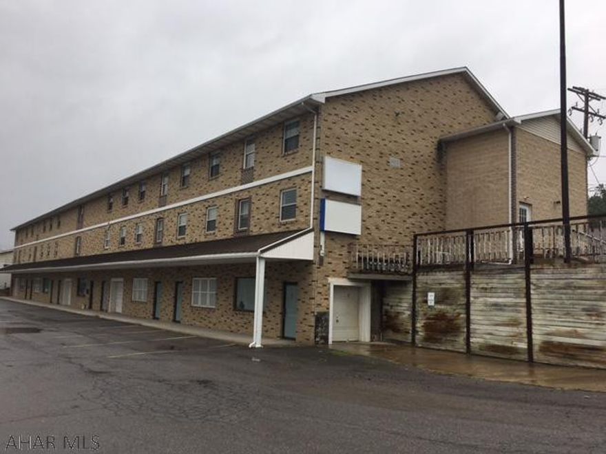 Three story commercial building on main thoroughfare.  Elevator to all floors.