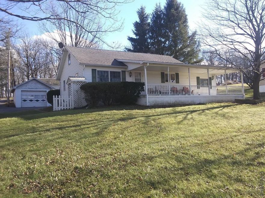 Well maintained two bedroom home with nice country setting!  Hardwood floors throughout, remodeled kitchen, hot water radiator heat and plenty of space outside!  Priced to move!