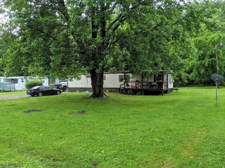 A 2 bedroom 1 bath single-wide mobile home on almost half an acre in Carsen Valley.