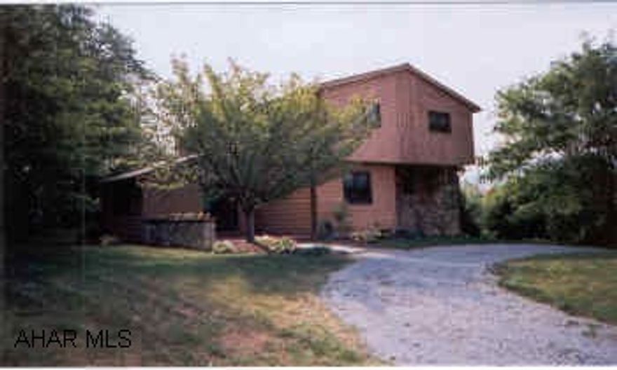 Stone and cedar 2-story Stunning stone and cedar 2-story.  Grogeous masters suite w/whirlpool bath, fireplace, separate dressing area w/ shower.  Balcony off master in addition to nice main level deck.  Radial heat in den / office floor. Total heat and lights only $137. month.  Call Listing Agent for Relocation Addendums and information.