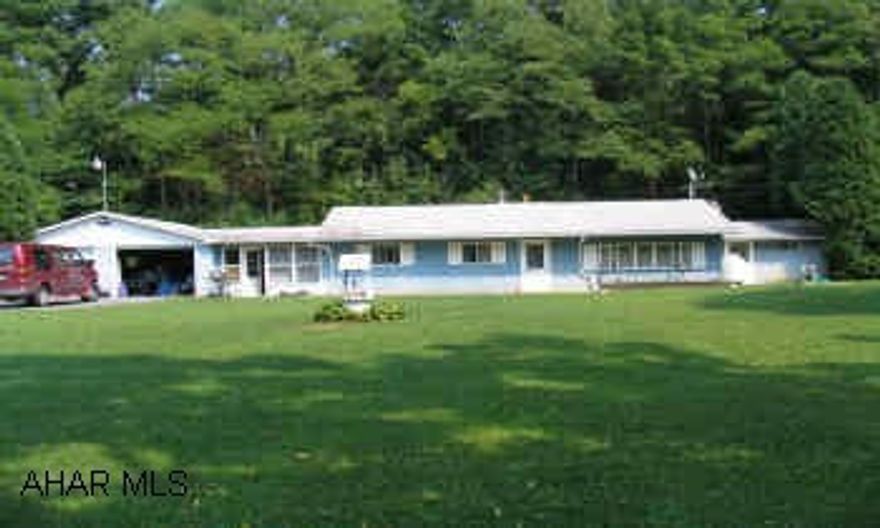 Walking distance to Spruce Creek, close to Little Juniata River.  Perfect for the fisherman!!  Great fly fishing!!  Location! Location! Location!  2.86 acres with a 2 bedroom, 1.5 baths, breezeway, bonus room, 3 car garages. Walking distance to Spruce Creek, close to Little Juniata River.  Perfect for the fisherman!!  Great fly fishing!!  Location! Location! Location!  2.86 acres with a 2 bedroom, 1.5 baths, breezeway, bonus room, 3 car garages.