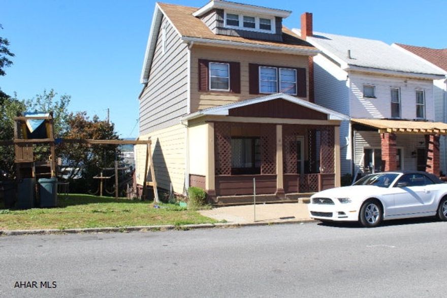 Well kept move in ready! Fenced yard, 2 nice porches, patio off basement entrance. Garage with alley access. Hardwood under carpet on the first floor. Washer and dryer located in the basement and 1st floor