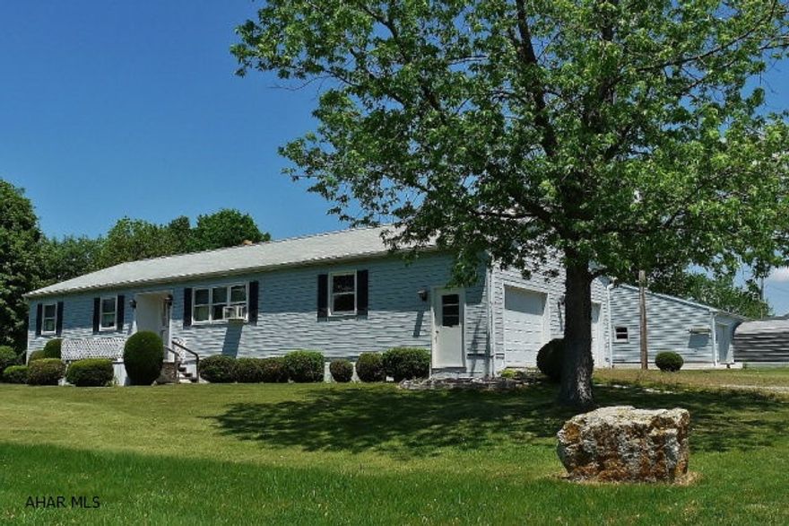 Well kept 3BD-1BA vinyl sided ranch home on full basement with attached 2-car garage. The detached 30x41 garage/shop and carport offers many possibilities. The home features city water, a new kitchen with oak cabinets and a new game room addition with skylights, gas FP and covered porch. The level 1.59 ac setting offers many garden possibilities and lovely pastoral views.