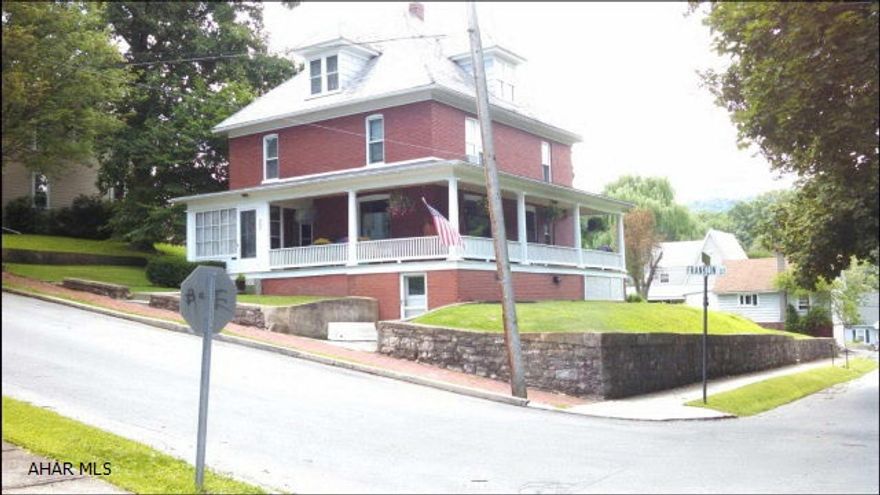 MOTIVATED SELLER! HUGE updated brick home on corner lot in Spring Cove School District. This home features original hardwood flooring, molding, pocket doors and a beautiful wrap around porch. This property also features a second, flat, lot across the street with a detached 2 car garage. Don't miss this amazing home! Call listing agent for your showing today!