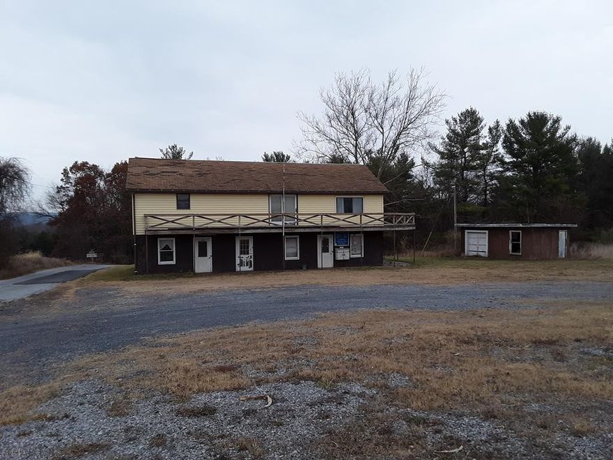 Formerly the Breezewood Camp Ground this RV park and campground has a lot to offer a new owner/investor!  The property is located in proximity to one of the busiest intersections in this part of the state.  The property has a main building that would serve as the park office and a retail space and also has an apartment.   There are RV hook ups with dump a station.  The back portion of the property can be used for rustic camp sites.  This property could also be used for hunting and out door recreation. Endless possibilities!