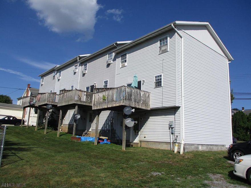 Great Investment  Opportunity!!! Four unit townhouse in Roaring Spring. Built in 1998 and in good condition. Each unit includes 3 bedrooms, 1 1/2 Baths and an integral garage.  Long term tenants, all separately metered utilities and tenants pay all utilities. Won't Last.