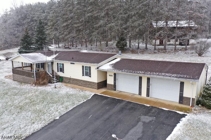 Enjoy 1 story living in this well maintained home on over an acre!  3 bedrooms and 2 full baths PLUS plenty of living area and a 2 car garage!  The home has a large master bedroom with attached master bath and walk-in closet.  There are two additional bedrooms and a full bath on the other side of the home.  The kitchen includes appliances and there is a laundry room with included washer and dryer off the kitchen.  The home has a formal dining room, living room, and additional living area with fireplace.  There is a covered front porch and rear deck as well as newer roof, furnace, and central ac unit.