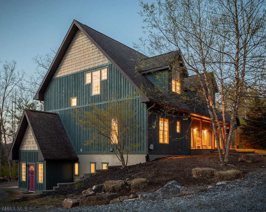 Board & Batton Beauty on Skytop. Tucked in next to Skytop Mountain Golf Club, this captivating home looks & feels like a retreat & it is only 10 minutes from Penn State. Solid wood doors with antique glass knobs add warmth & character. The semi open floor plan features high ceilings, excellent daylighting & top drawer craftsmanship. First floor master suite opens to a spacious front deck. The kitchen with it's Thermador Masterpiece appliances will inspire foodies. The second floor loft overlooks the massive cross beams in the great room. Exposed ductwork & large skylights give the loft a serene modern edge. Walk out lower level has a laundry room with adjacent craft/hobby space. There are also two large garage bays plus an unfinished 850 sf space with a separate entrance.