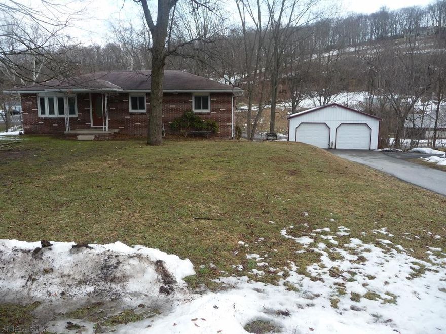 Nice 3 BR/2Ba brick home on a large tree shaded lot in convenient close to town location. The home offers a large eat-in kitchen, a dining room w/beautiful tray ceiling and a large living room. The main level also offers 3 bedrooms w/hardwood floor and a  bath.  The lower level features a large family room with a wood burning fireplace w/FP insert, an extra large bonus room, partially finished, with a laundry area and a  bath. The property also includes a large detached garage  (24' x 26 ) and storage shed. Kitchen and laundry appliances included.