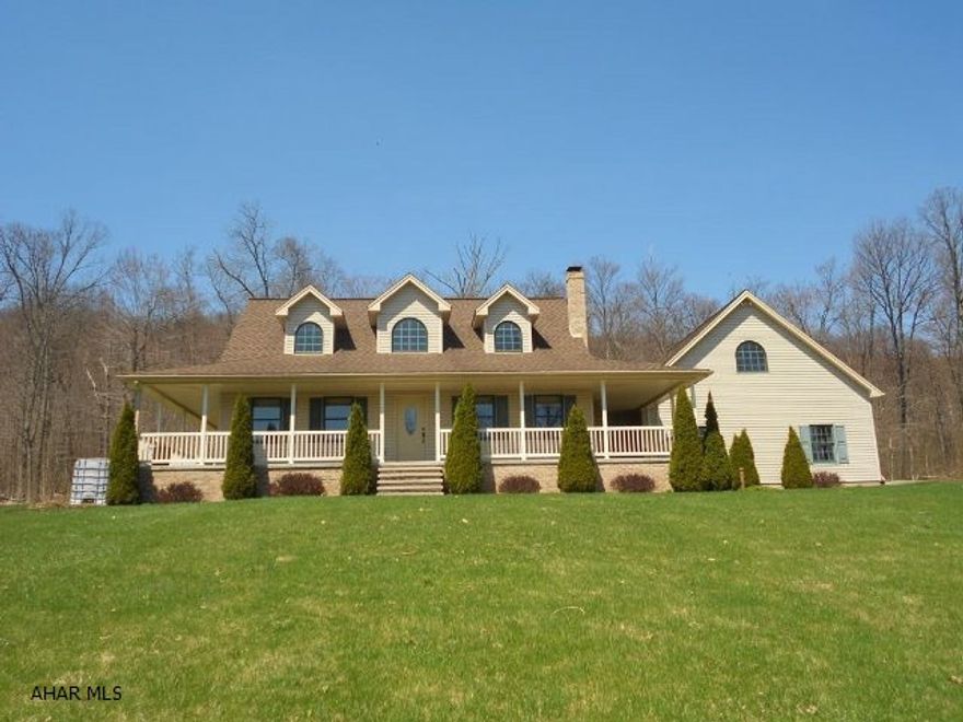 This is the home you've been waiting for. Built in 2004 with quality construction on a 3.12 acre lot. Vinyl and brick siding with 40 year shingled roof. Wraparound porch in the front and large sunroom in rear. Four heat zones. Efficient with good insulation. Heated garage and basement floors. Finished 28 x 15 bonus room above garage; master bedroom and bath on first floor. Everything is in excellent condition and the location has tree and some woods, professional landscaping, paved driveway. Many more amenities, don't wait to see this simply lovely home.
