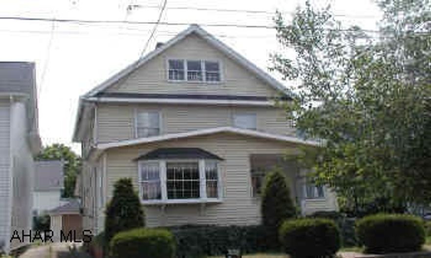 3 bedroom home with finished 3rd floor.  2 car garage, newer roof.