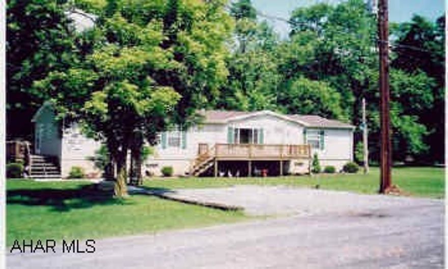 Rancher - triple lot - garage space for 3 cars. Excellent condition.