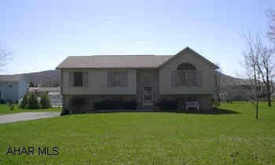 Lovely 3 Bedroom. 1 1/2 Bath, Bi-level with Cathedral Ceilings, Oak kitchen, Large Covered Rear Deck & New Black Top Driveway.  No Showings until 04-12-04