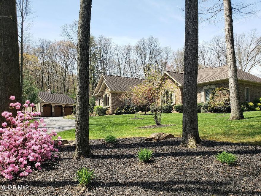 Exquisite quality 4-bedroom, 4.5-bath brick 6,739 sq ft home with finished basement including a train room, main level with laundry, great room, bar pool table room/sun room, breakfast room, Kitchen with double sinks + corian counters, primary bedroom ensuite w/walk-in closet + adjacent office, 2-car attached + 3-car detached garage on professionally landscaped 2 Ac corner lot in Smith Dev. J-647