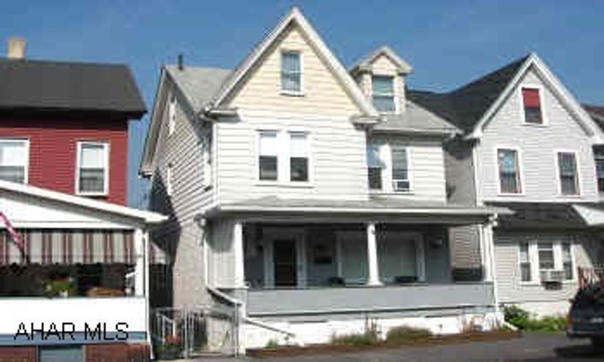 PARQUET AND LAMINATE FLOORING, NEWER REPLACEMENT WINDOWS, C/A AND FURNACE.  2 YEARS OLD.  FENCED REAR YARD.  200 AMP.  1 CAR GARAGE.  FAMILY ROOM ON 1ST FLOOR.