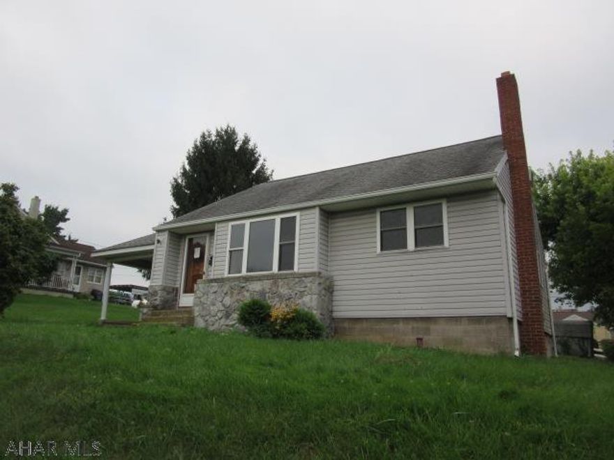 Great Roaring Spring location- potential for a two unit or in-law suite, one story addition off kitchen has a separate entryway, living room, kitchen, bedroom and bath, main house has 2 bedrooms, 1 bath and finished attic area, hardwood floors