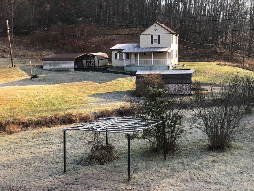 Location, location, location!  Nice two story, 3 bedroom, 1 bath home on 1 acre with beautiful mountain views is located 2 miles south of Hyndman!  Features include updated eat-in kitchen, first floor master and first floor laundry, 2 sheds and a carport.