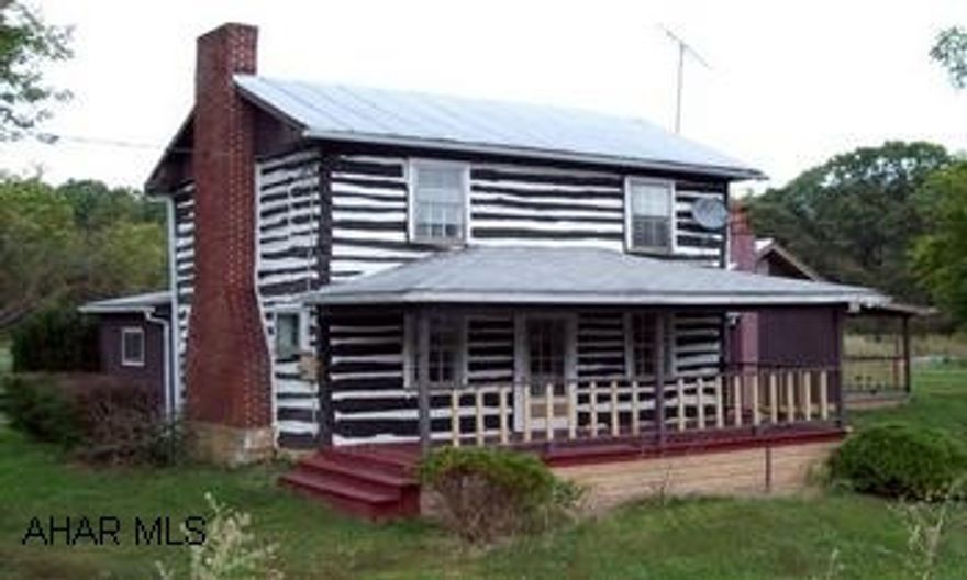 2-story log home on 2.6 acres!  Some plank flooring, barn, fenced pasture, 1 car garage.  Won't last!No disclosures - bank owned. Two-story log home on almost 3 acres!  Barn, garage, fenced pasture.  Nice curb appeal. No disclosures - bank owned.