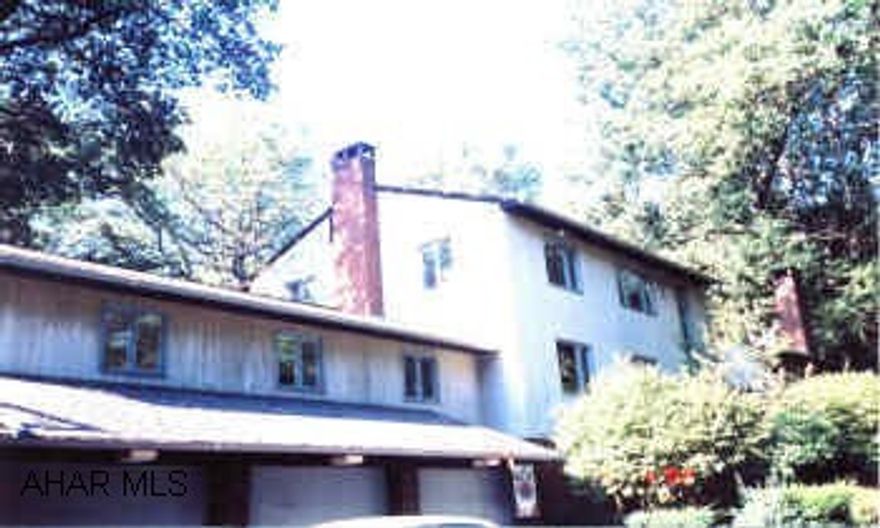 PROPERTY WITH GREAT POTENTIAL.  ATTACHED APARTMENT TO HOUSE, GAZEBO OVER HOT TUB, SPA, INGROUND POOL, LOVELY SUNROOM.  ADDITIONAL PROPERTY (BLUE BUILDING) CAN BE INCLUDED FOR A TOTAL OF $350,900.  3 CAR ATTACHED GARAGE AND 2 CAR DETACHED GARAGE.