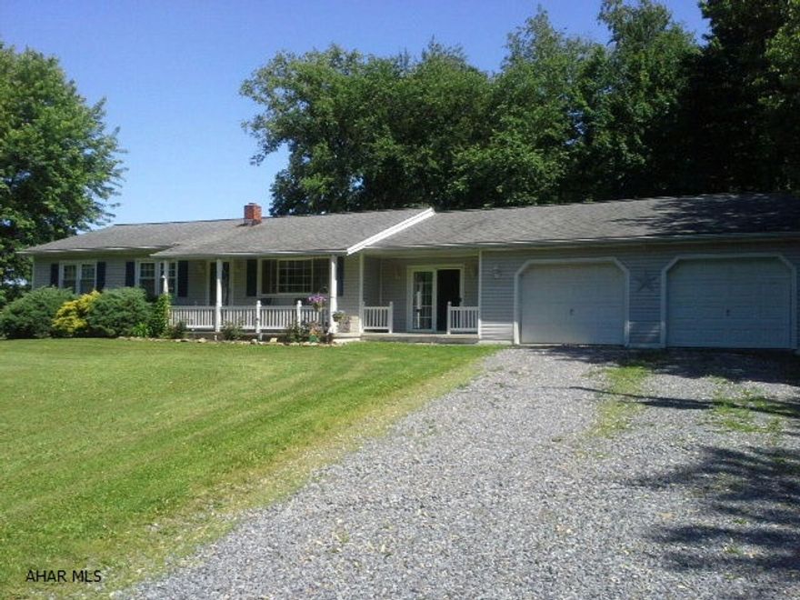 Great country home on 2.5 acres with a pasture and newer barn. Oak trim and updated bath and kitchen. Finished basement with family room and bath.