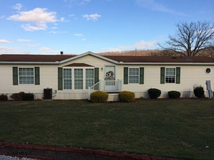 Well maintained 27x67 Skyline doublewide. 3 bedrooms and 2 full baths including master BR and master BA. Large family room with beautiful built-in entertainment center. Spacious kitchen with island and loads of storage. Formal dining room with 2 built-in corner cupboards. Formal living room with bay window. Located in prime location within Friendship Village. Rented lot with all the amenities that Friendship Village offers..pools, miniature golf, church, music, etc. Forced air oil and central air. 12x14 inviting sun porch to enjoy the summer evenings. 12x40 carport to easily accommodate 2 vehicles. 12x16 outbuilding with electric. Professional landscaping. Immaculate and move-in ready.