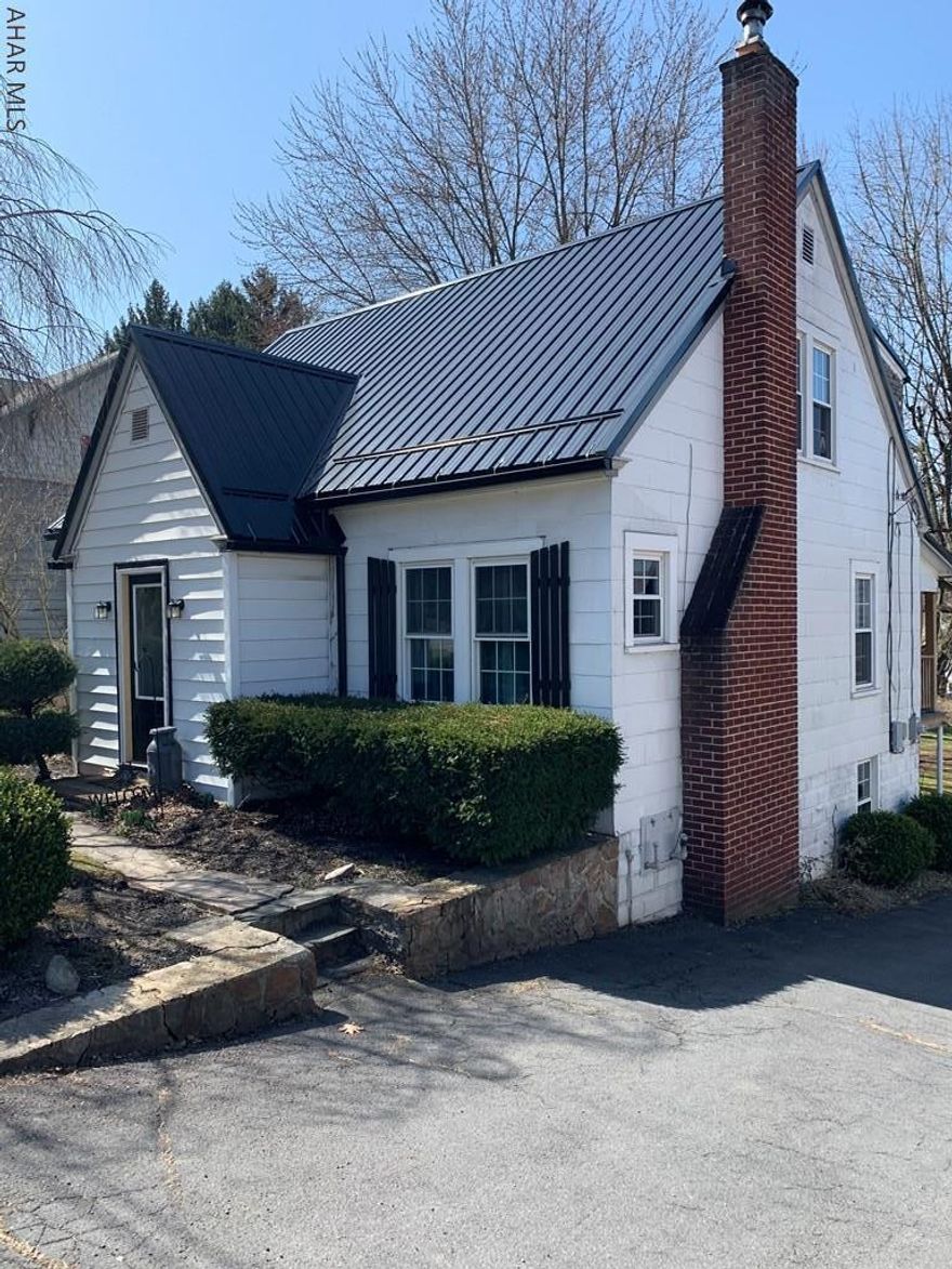 Welcome home!!  You won't want to miss what this house has to offer!! 3 bedrooms, 1.5 bath spacious living and dinning room with a beautiful kitchen! Many updates including a metal roof. Beautiful covered deck that is covered overlooking your back yard.  Great space in basement to make it your own. Walk out basement to your back yard and garage.  2 car garage with plenty of storage.  Located just minutes from downtown Bedford, PA Turnpike and Bedford Elementary School.  Schedule your showing today!!