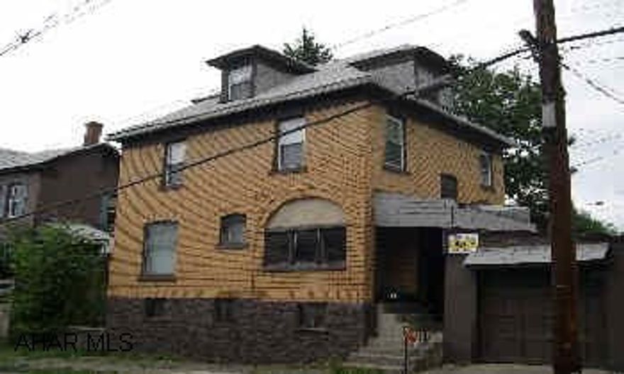 Very nice brick home. Home is on a 48x25 lot and extra rear lot is 25x122.