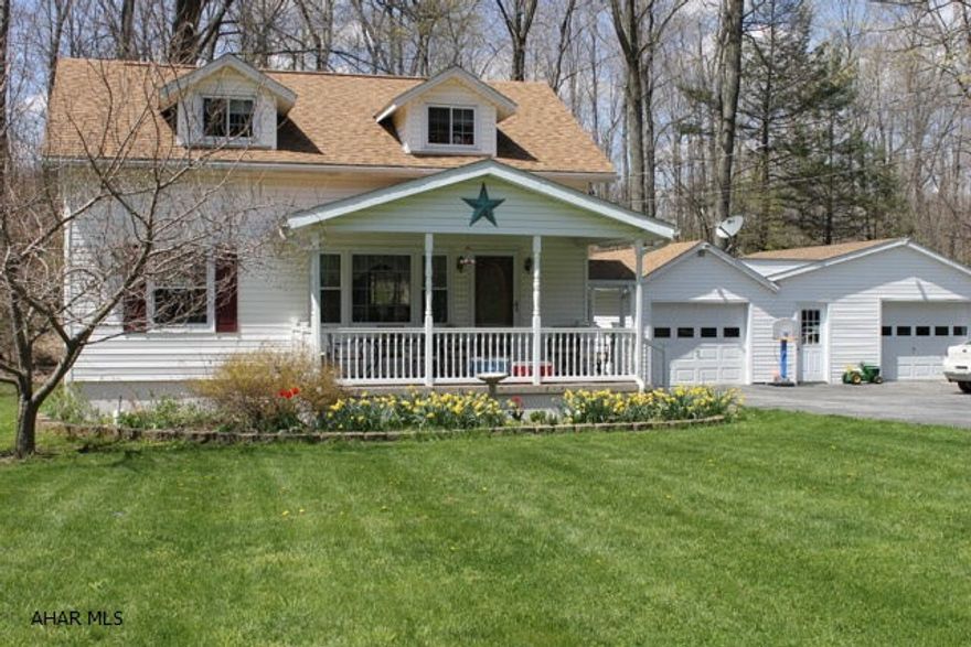 Adorable 4 bedroom home on gorgeous 1.08 acre setting. Updated electric, hardwood floors and large upstairs bedrooms. Large 2 car garage with workshop. Level yard with stream in the back. Security System